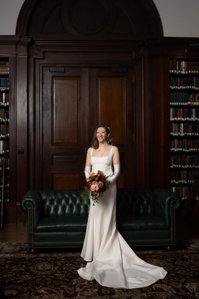 A classic portrait of a bride in an Ines di Santo gown in the library at a classic wedding at The Union League of Philadelphia. 