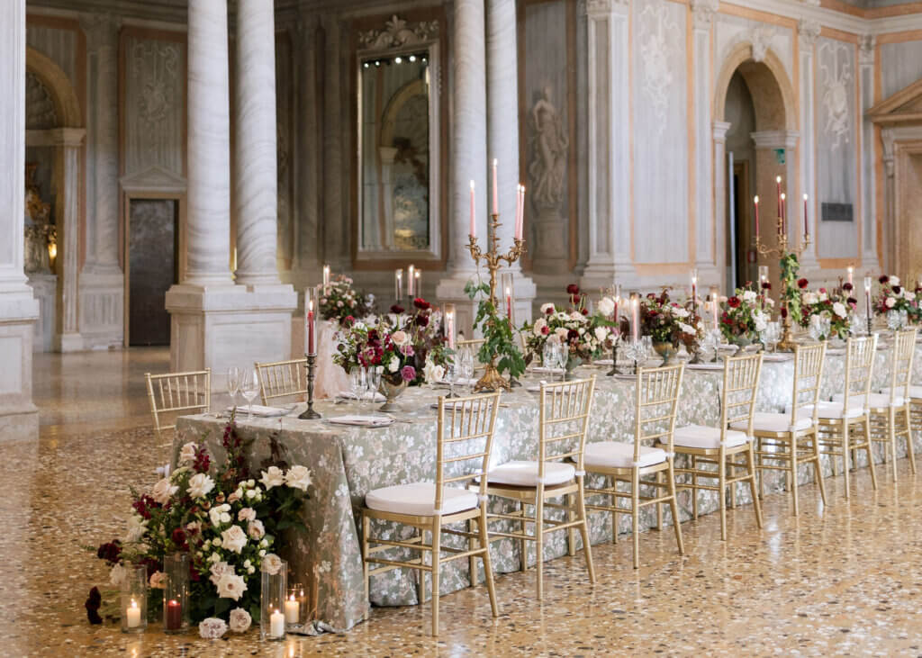 The dramatic reception details in the Hotel Monaco ballroom at an Italy Destination Wedding in Venice.