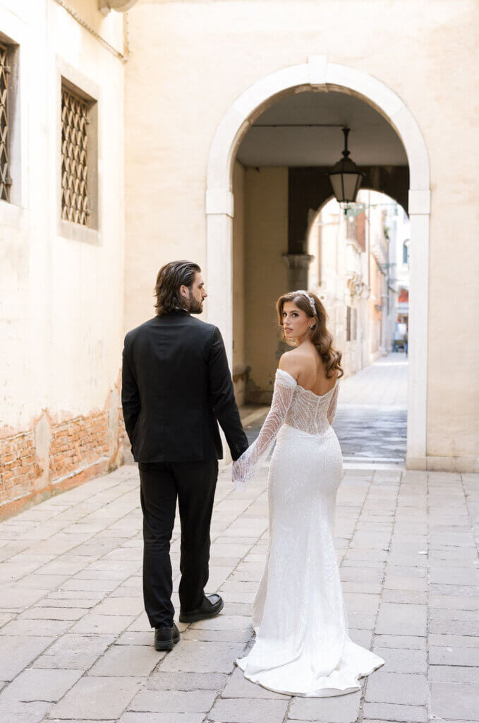 A portrait of the Bride and Groom at an Italy Destination Wedding at the Hotel Monaco & Grand Canal in Venice.