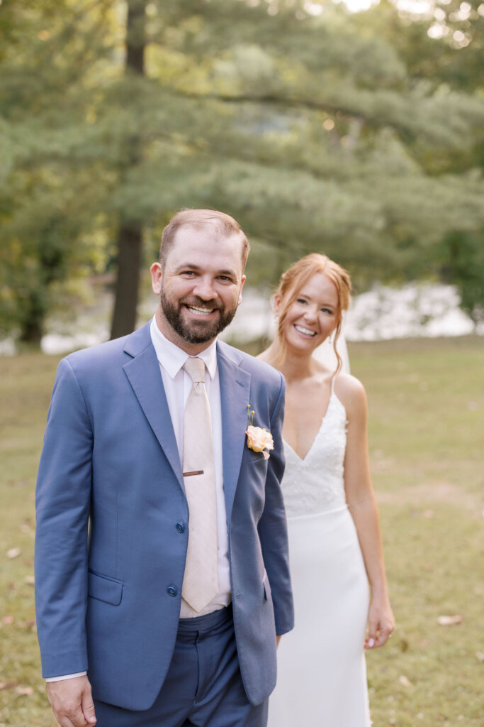 Portrait of bride and groom walking on the grounds of Riverdale Manor in Lancaster, Pennsylvania.