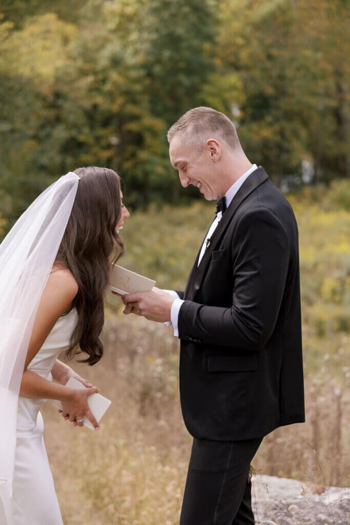 The bride and groom share emotional private vows during their first look at John James Audubon center with Jeffrey Miller Catering.