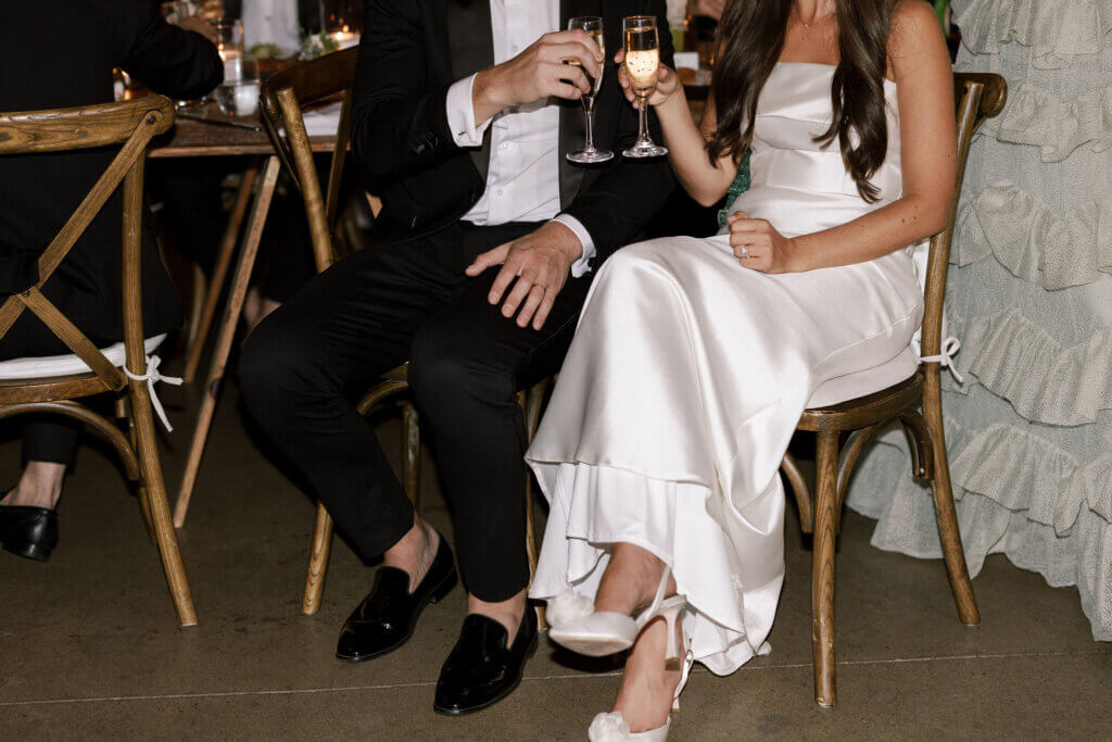 The bride and groom react to amazing toasts and speeches at their reception at John James Audubon center with Jeffrey Miller Catering.