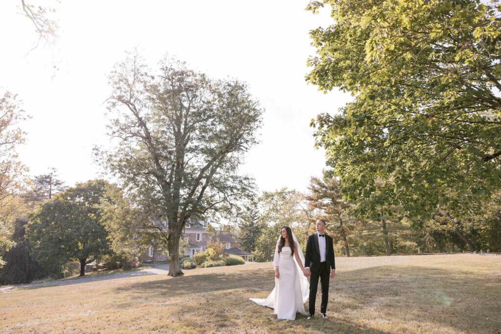 The bride and groom and their bridal party at John James Audubon Center with Jeffrey Miller Catering.