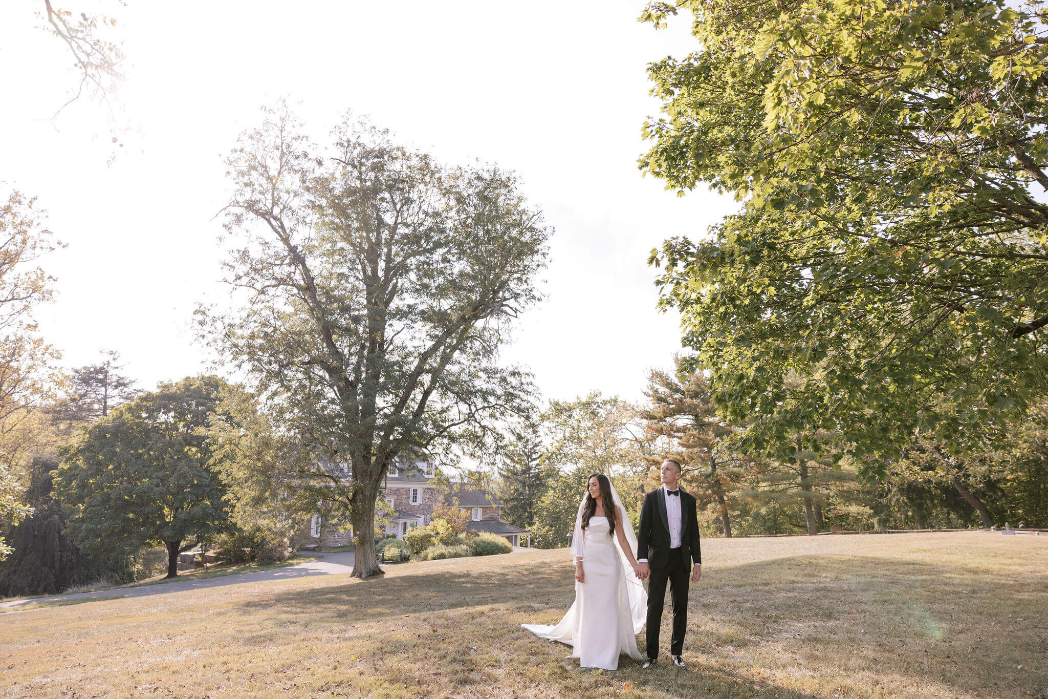 The bride and groom and their bridal party at John James Audubon Center with Jeffrey Miller Catering.