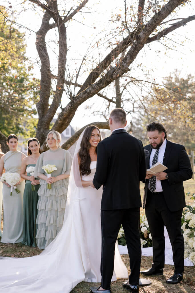 A beautiful and emotional first kiss at the ceremony at John James Audubon Center with Jeffrey Miller Catering.