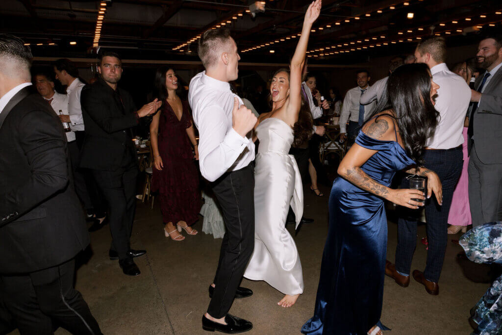 The bridal party turns up the heat at a great dance party reception at John James Audubon Center with Jeffrey Miller Catering.