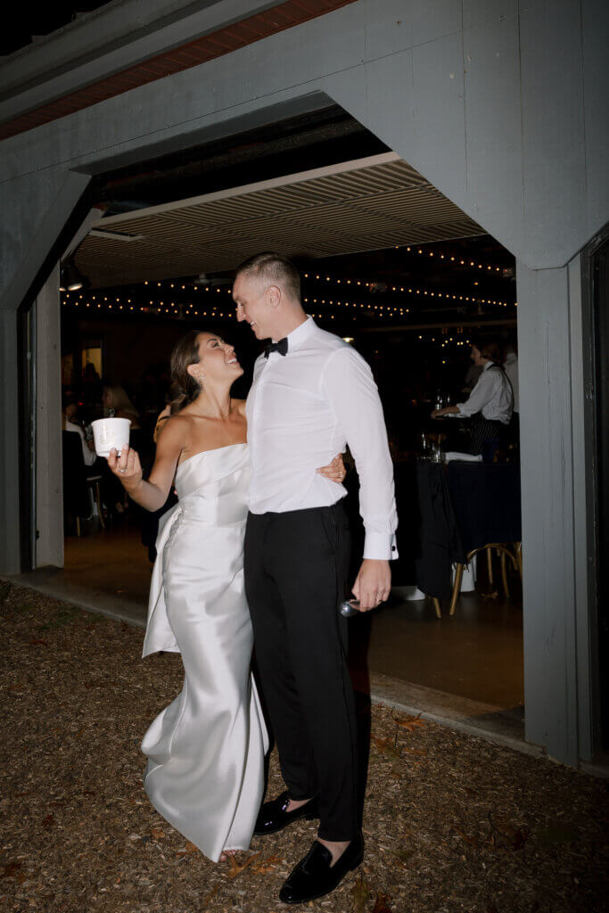 A portrait of a bride and groom at John James Audubon center.