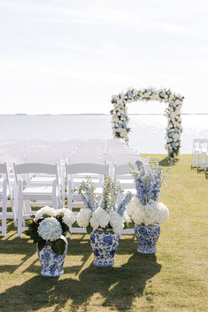 All the floral details of the ceremony by Franklin Floral Design at the Rehoboth Beach Country Club. 