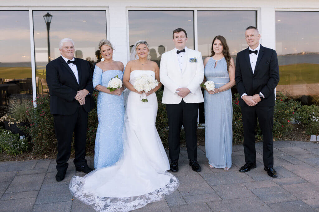 A family portrait at a wedding at the Rehoboth Beach Country Club.