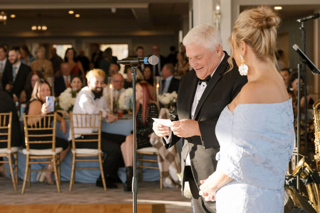 The father of the bride gives a speech at the reception at the Rehoboth Beach Country Club. 