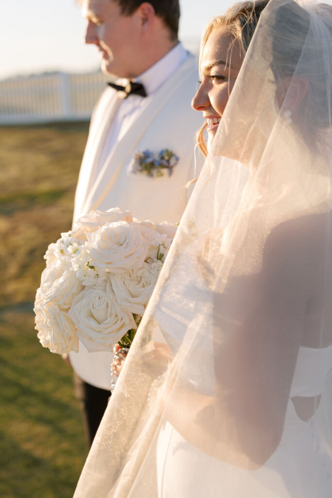 A candid portrait of the bride and groom at Rehoboth Beach Country Club.