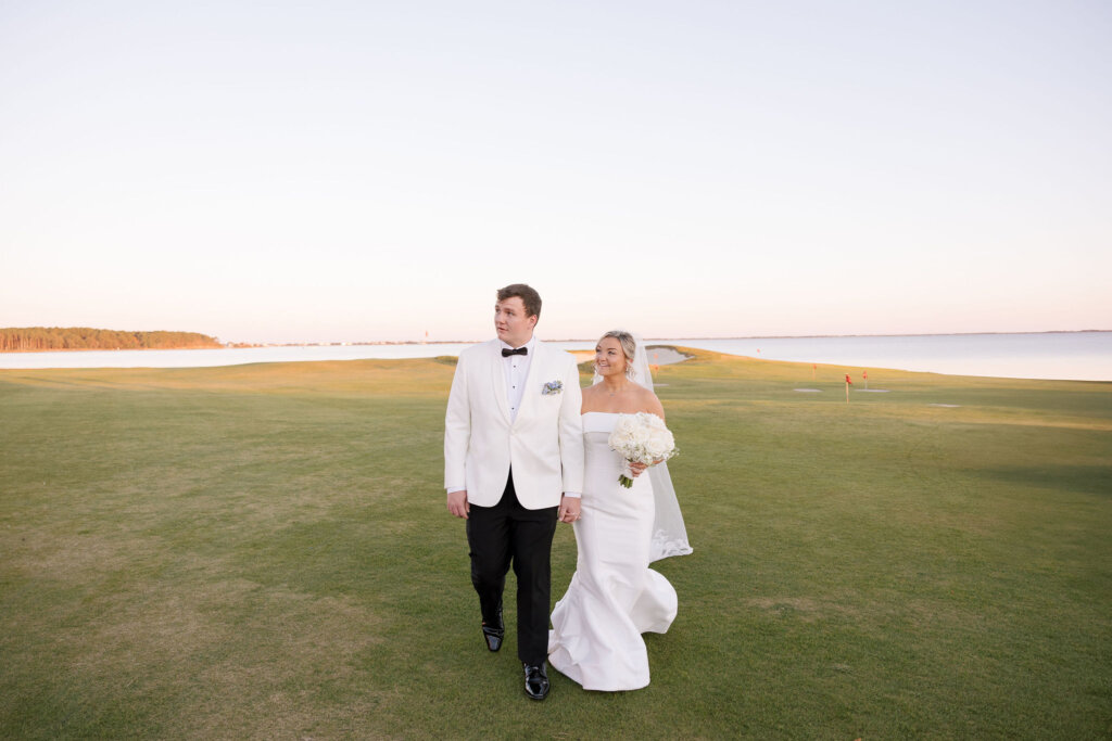 The bride and groom head to their cocktail hour after their ceremony at Rehoboth Beach Country Club.