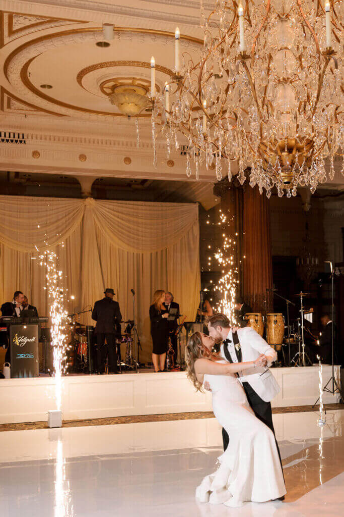 The bride and groom enjoy the sparklers by Finley Catering at the Crystal Tea room.