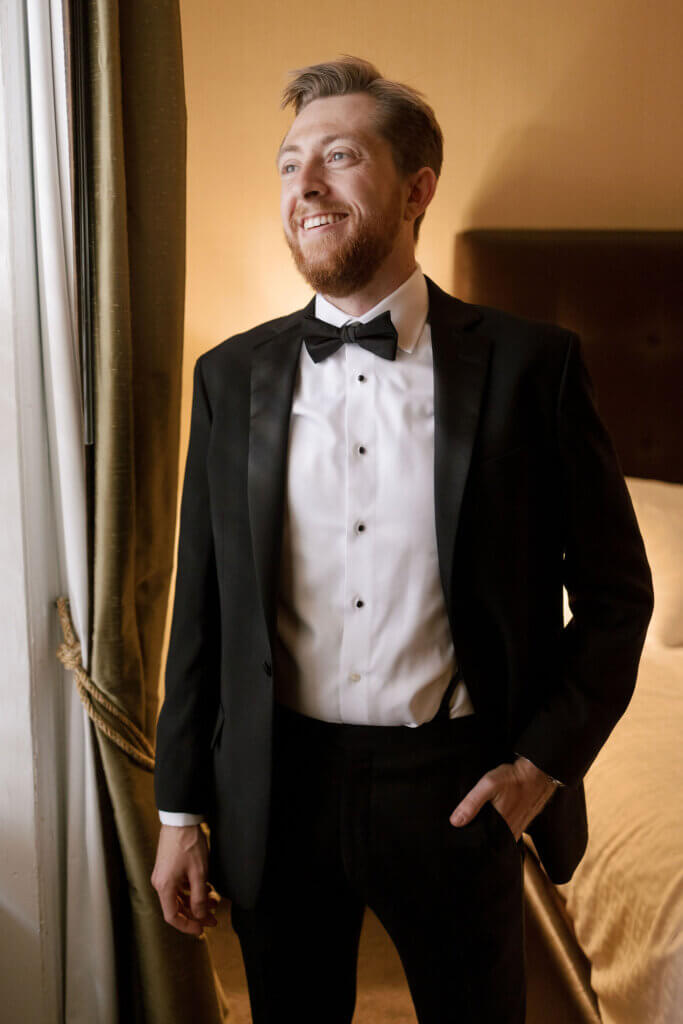 The groomsmen get ready before the wedding at the Crystal Tea Room.