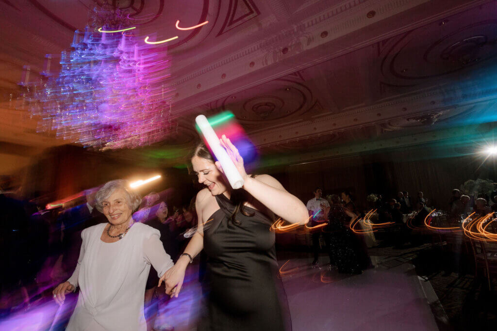 The bride and groom and their guests dance the night away at the Crystal Tea Room by Finley Catering.