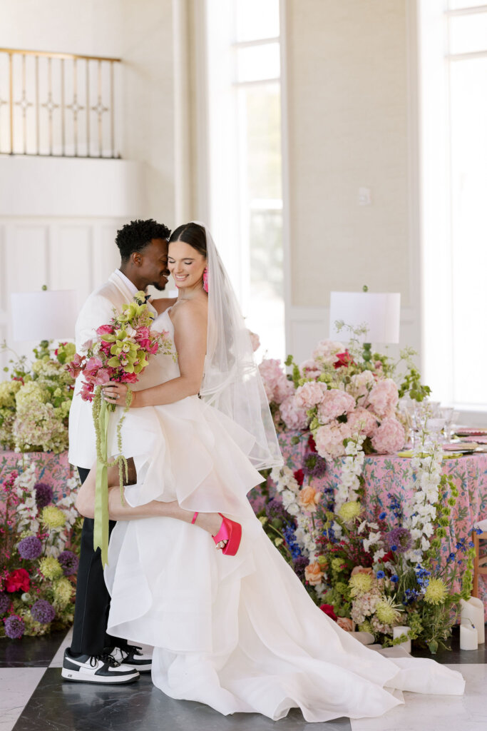 An incredibly colorful and vibrant affair with lush floral decor at Elkins Estate.