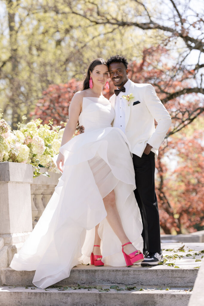 The bride and groom exit with excitement from their ceremony at Elkins Estate.