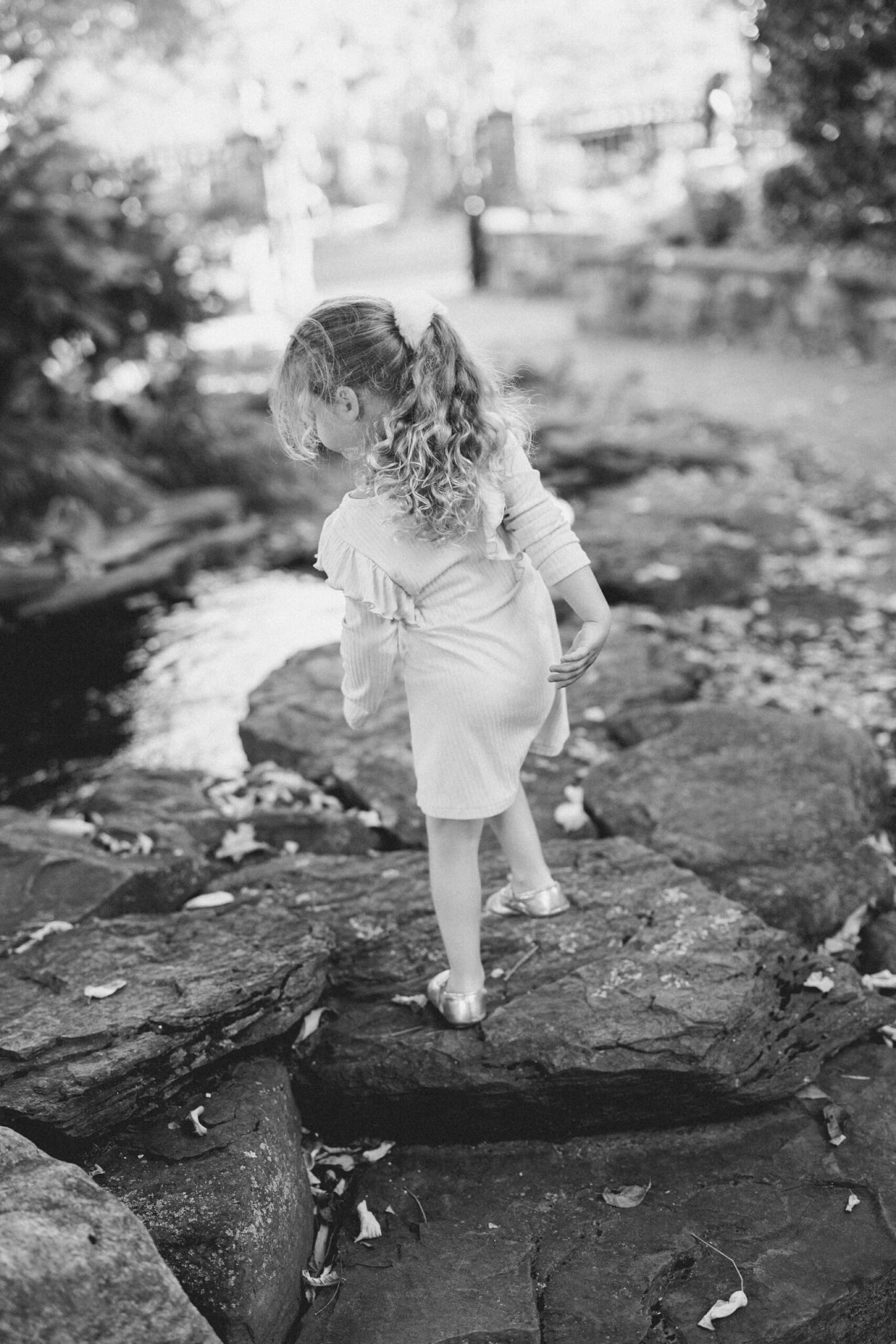 Candid moments with a family and grandparents during a cinematic family session in New Hope, Pennsylvania.